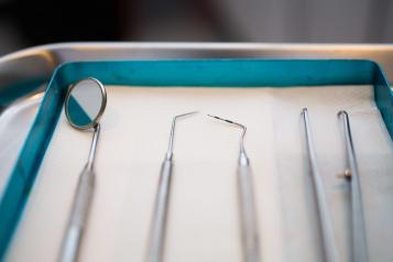Dental instruments laid on a tray 