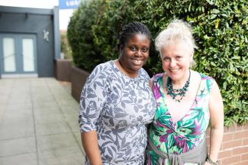 image of two females smiling