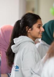 Young females smiling